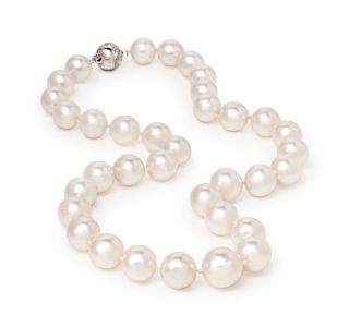 A 14 Karat White Gold, Diamond and Cultured South Sea Pearl Necklace,