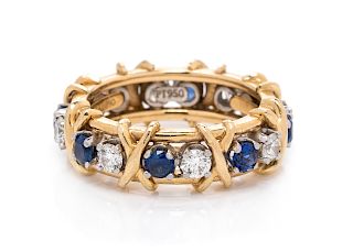 An 18 Karat Yellow Gold, Platinum, Diamond and Sapphire 'Sixteen Stone' Ring, Schlumberger Studios for Tiffany & Co.,