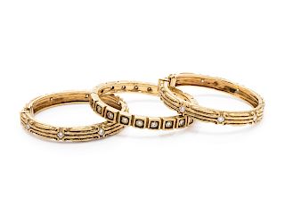 A Collection of 18 Karat Yellow Gold and Diamond Bangle Bracelets, Katy Briscoe,