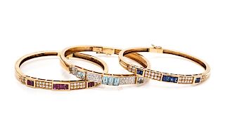 A Collection of Yellow Gold, Diamond and Multigem Bangle Bracelets,