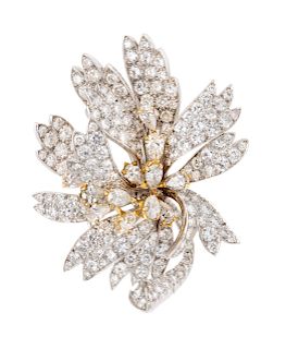 A Platinum, Yellow Gold and Diamond Flower Pendant/Brooch,