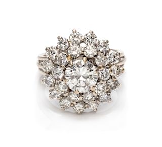 An 18 Karat White Gold and Diamond Cluster Ring,