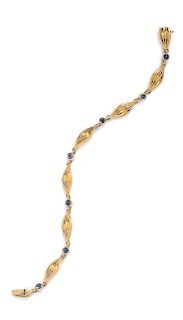 An 18 Karat Yellow Gold and Sapphire Bracelet, French,
