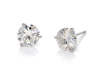 A Pair of 14 Karat White Gold and Diamond Stud Earrings,