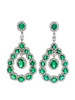 A Pair of 18 Karat White Gold, Emerald and Diamond Earclips,
