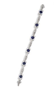 A 14 Karat White Gold, Sapphire and Diamond Bracelet,