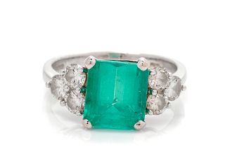 An 18 Karat White Gold, Emerald and Diamond Ring,