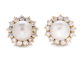 A Pair of 18 Karat Yellow Gold, Cultured South Sea Pearl and Diamond Earclips,