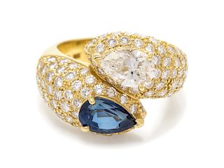 A Vintage 18 Karat Yellow Gold, Sapphire and Diamond Bypass Ring, Cartier,