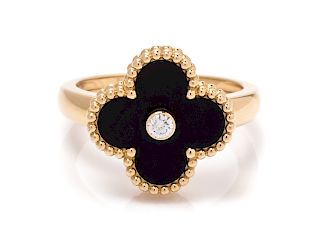 An 18 Karat Yellow Gold, Onyx and Diamond 'Alhambra' Ring, Van Cleef & Arpels,