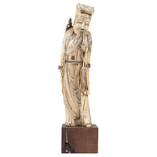 WARRIOR. CHINA, CIRCA 1900. Carved ivory model with ink details. 