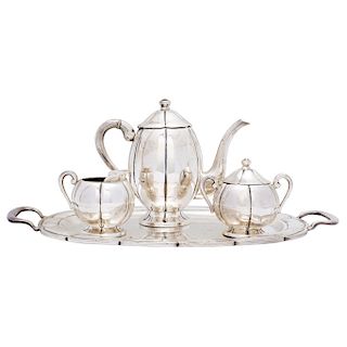TEA SET. MEXICO, 20TH CENTURY. Sterling 0.925 Silver. Brand: SANBORNS. Ovoid form. The body lobed and wavy. With handles. 4 pieces.