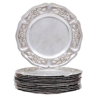 BREAD PLATE SET. MEXICO, 20TH CENTURY. Sterling 0.925 Silver. Brand: SANBORNS. Circular with chased and repoussé details.