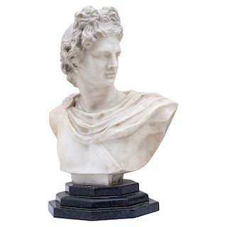 BUST OF APOLLO. ITALY (?), 19TH CENTURY. White marble with black marble base.
