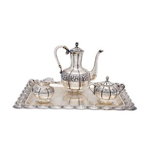 TEA SET. MEXICO, 20TH CENTURY. Sterling 0.925 Silver. Brand: SANBORNS. The body with repoussé and chased strapwork. Comprising a teapot, a sugar bowl,