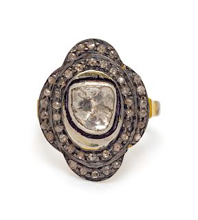 A Silver Topped Yellow Gold Plated and Diamond Ring,