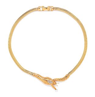 A 14 Karat Yellow Gold and Diamond Ourobouros Necklace,