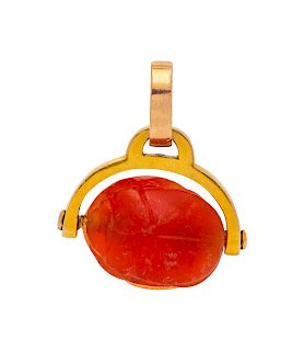 A Possibly Ancient Yellow Gold and Carved Carnelian Scarab Pendant,