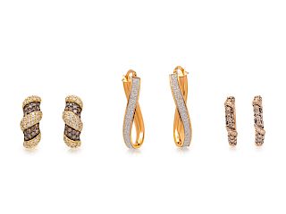 A Collection of Gold and Diamond Earrings,