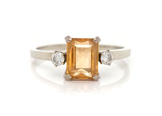 An 18 Karat White Gold, Topaz and Diamond Ring,