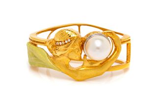 An 18 Karat Yellow Gold, Cultured Pearl, Diamond and Enamel Enhancer, Masriera,