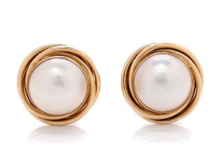 A Pair of 14 Karat Yellow Gold and Cultured Mabe Pearl Earclips,