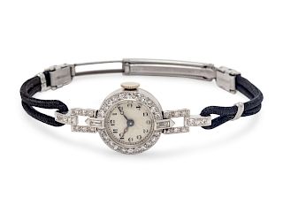 A Platinum and Diamond Wristwatch,