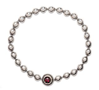 A Silver and Garnet Necklace,