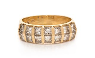 A 14 Karat Yellow Gold and Diamond Ring,