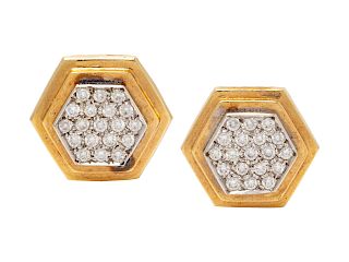 A Pair of 14 Karat Yellow Gold and Diamond Earclips,