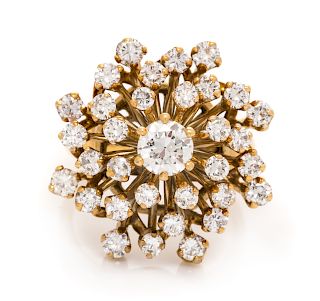 A 14 Karat Yellow Gold and Diamond Cluster Ring,