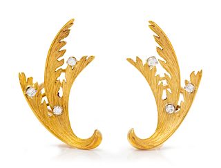 A Pair of 18 Karat Yellow Gold and Diamond Leaf Motif Earclips,