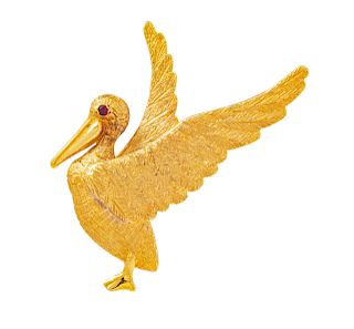 An 18 Karat Yellow Gold and Ruby Pelican Brooch, Cellino,