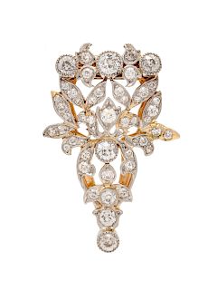 A Platinum Topped Yellow Gold and Diamond Clip Brooch,