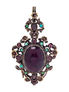 An Antique Silver, Garnet and Turquoise Locket