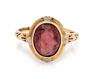 A Yellow Gold and Purple Simulant Ring,