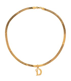 A 14 Karat Yellow Gold Charm and Necklace,