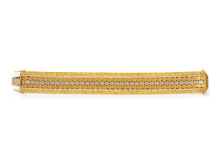 An 18 Karat Bicolor Gold Bracelet,