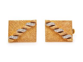 A Pair of 14 Karat Bicolor Gold and Diamond Cufflinks,