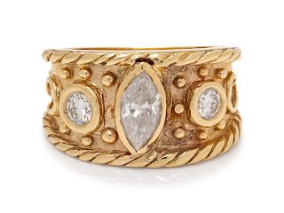 A 14 Karat Yellow Gold and Diamond Ring,