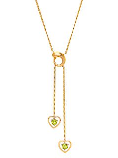 A 14 Karat Yellow Gold and Peridot Necklace,