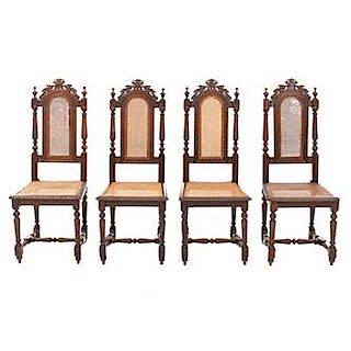Lote de 4 sillas. Francia. Siglo XX. Estilo Enrique II. En talla de madera de roble. Con respaldos semiabiertos y asientos de bejuco.
