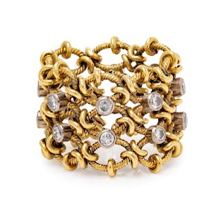 A Yellow Gold and Diamond Flexible Ring,