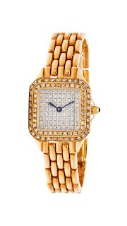 A 14 Karat Yellow Gold and Diamond Watch,