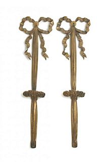 A Pair of Gilt Bronze Wall Appliques, Height 22 3/4 inches.
