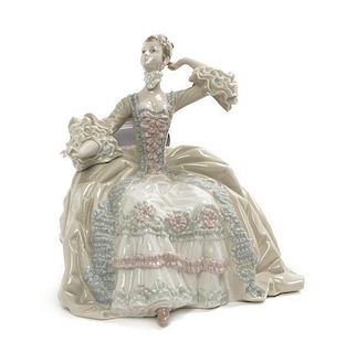 A Lladro Porcelain Figure, Height 9 1/4 inches.