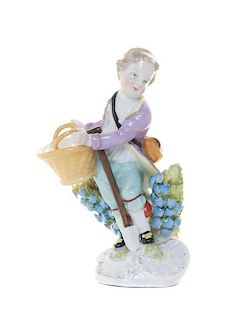 A German Porcelain Figure, Height 4 3/4 inches.