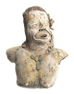 A Mayan Style Stucco Bust of a Goddess. Height 20 1/2 inches.