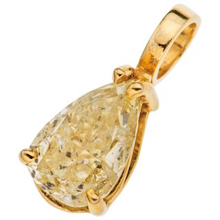 A diamond 14K yellow gold pendant.