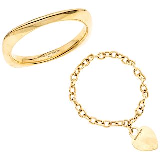 TIFFANY & CO. 18K yellow gold bangle bracelet and bracelet.